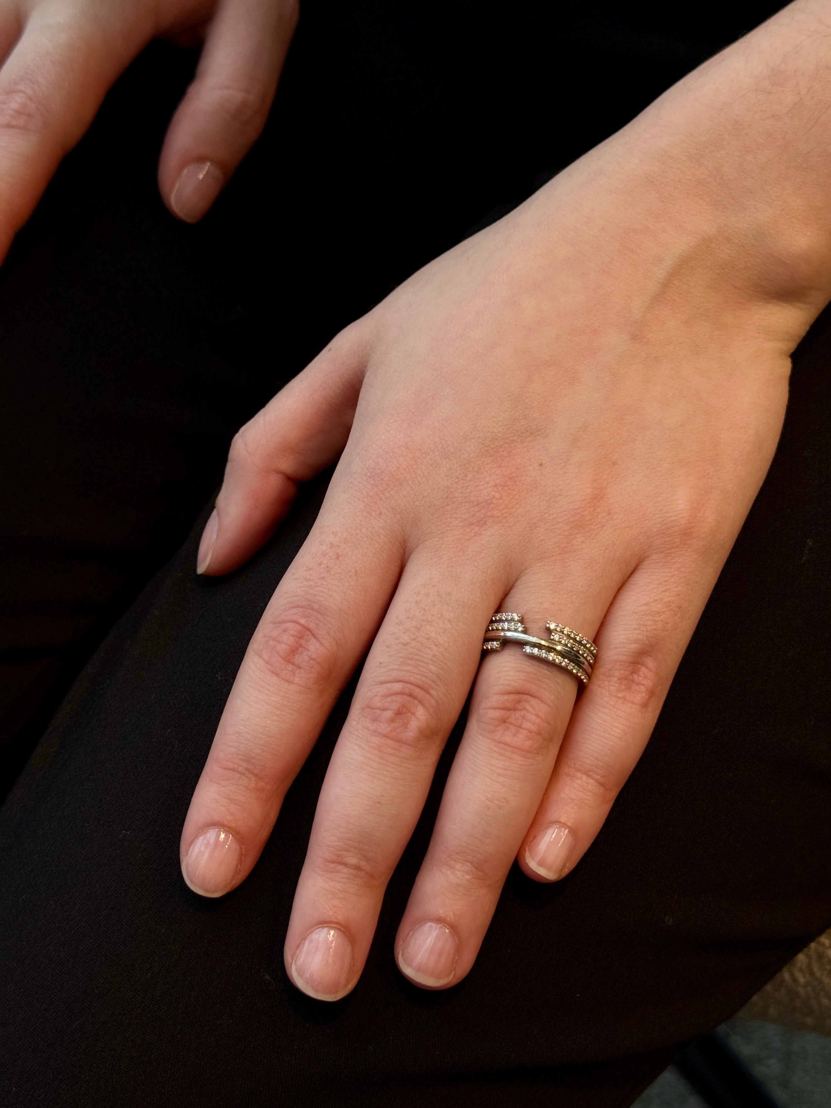 Upper E ring inspired by the world of Gossip Girl. Crafted in Montreal in solid white gold 10k, 14k, 18k) and 24k vermeil. Worn by hand model.