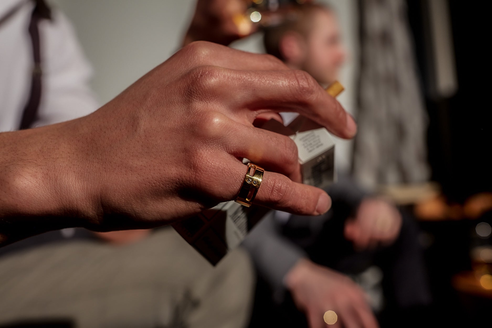 Meet in the Middle symbolic couple ring in gold worn by a man handcrafted in Montreal by DE MONT Fine Jewelry