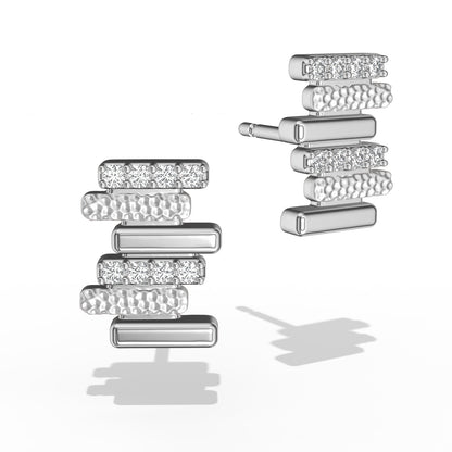 LAVERTUE is a poetic fine earrings inspired by a timeless fable about patience and healing. Designed in Montreal, available in solid white gold and 24k vermeil, with zircon or diamond stones.