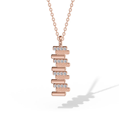LAVERTUE is a poetic fine necklace inspired by a timeless fable about patience and healing. Designed in Montreal, available in solid rose gold and 24k vermeil, with zircon or diamond stones.