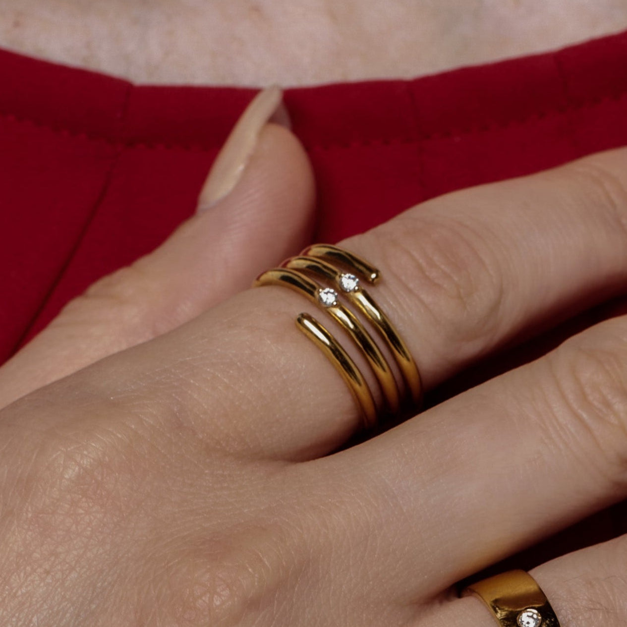Whirly ring, solid rose gold (10k, 14k, 18k) or 24k vermeil, with two stones of 2 mm (zirconian or diamond), inspired by a love song of Jeanne Moreau, by DE MONT Fine Jewelry.